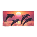 Four Dolphins Beach Towel