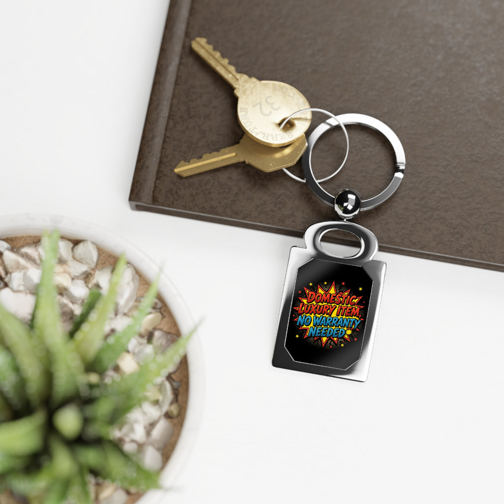 Metal Keyring — "Domestic Luxury Item, No Warranty Needed" Comic Design